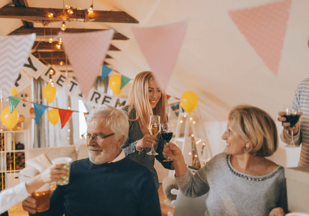couple drinking wine retirement party games