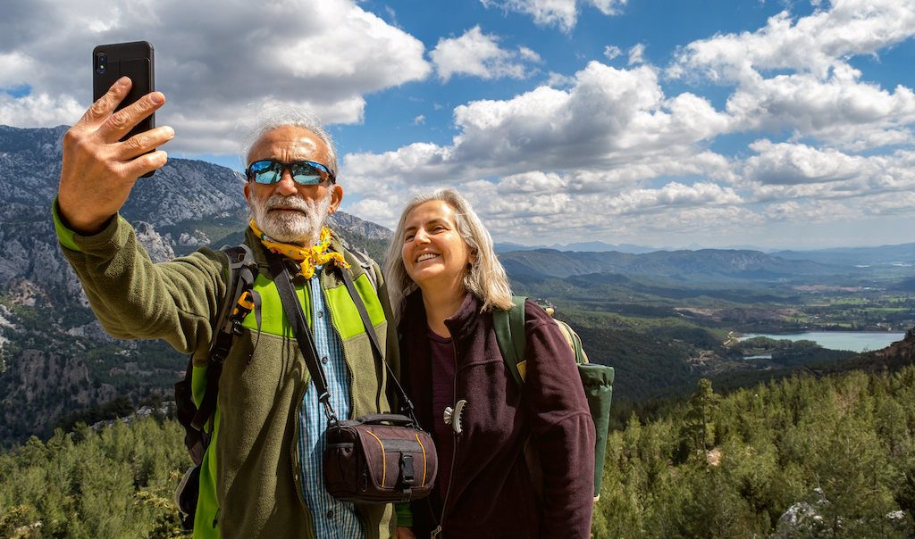 senior couple taking pictures Words of Encouragement for Retirement