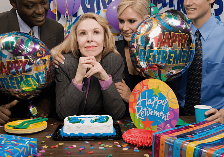 Office party room, woman with cake at center table, coworkers surrounding, afternoon indoor light, documentary style, several people.