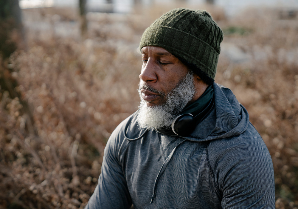 mature man meditating outside things to do when retired and bored
