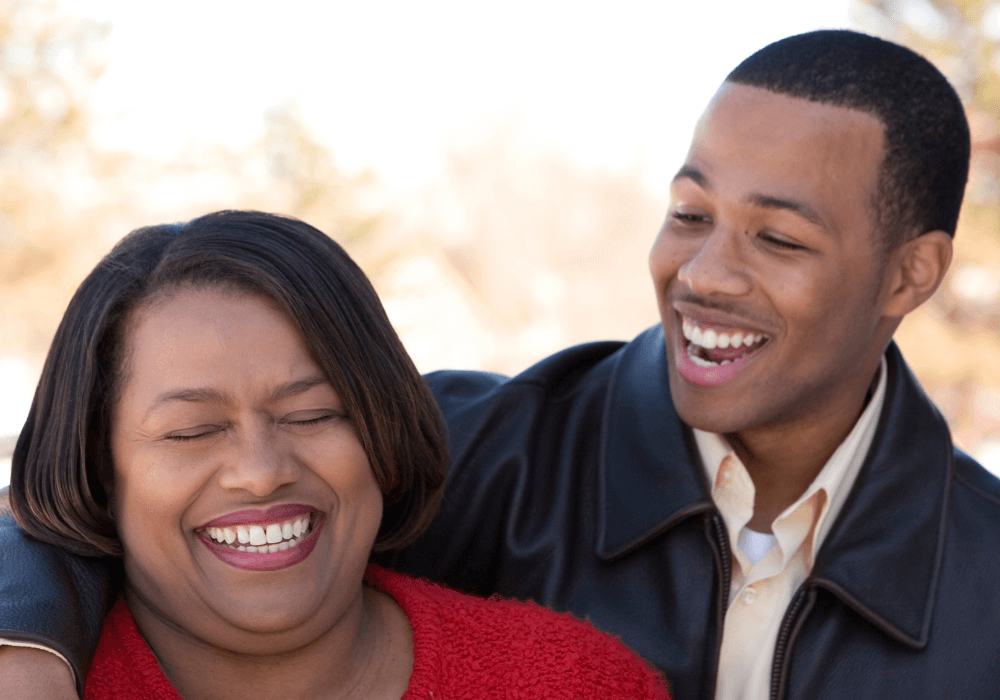 young man hugging older woman Nice Things Every Parent Needs To Say To Their Grown Son