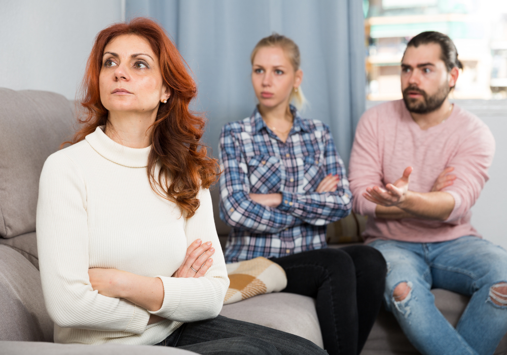 mature man and woman trying to talk to mom