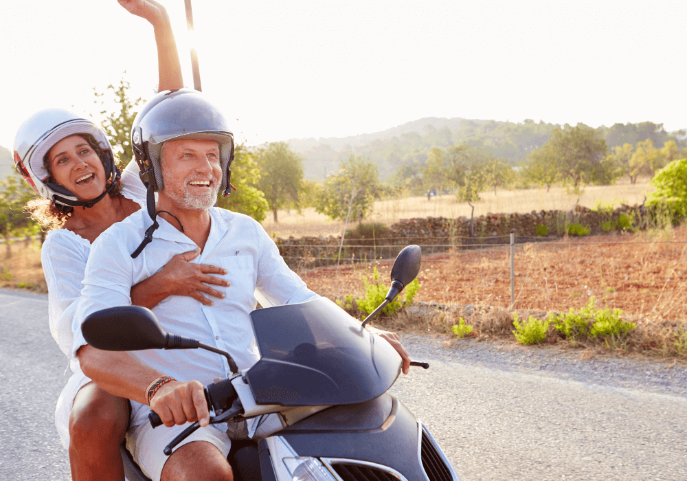 mature couple enjoying a motorcycle ride woman over 50 dating profile examples