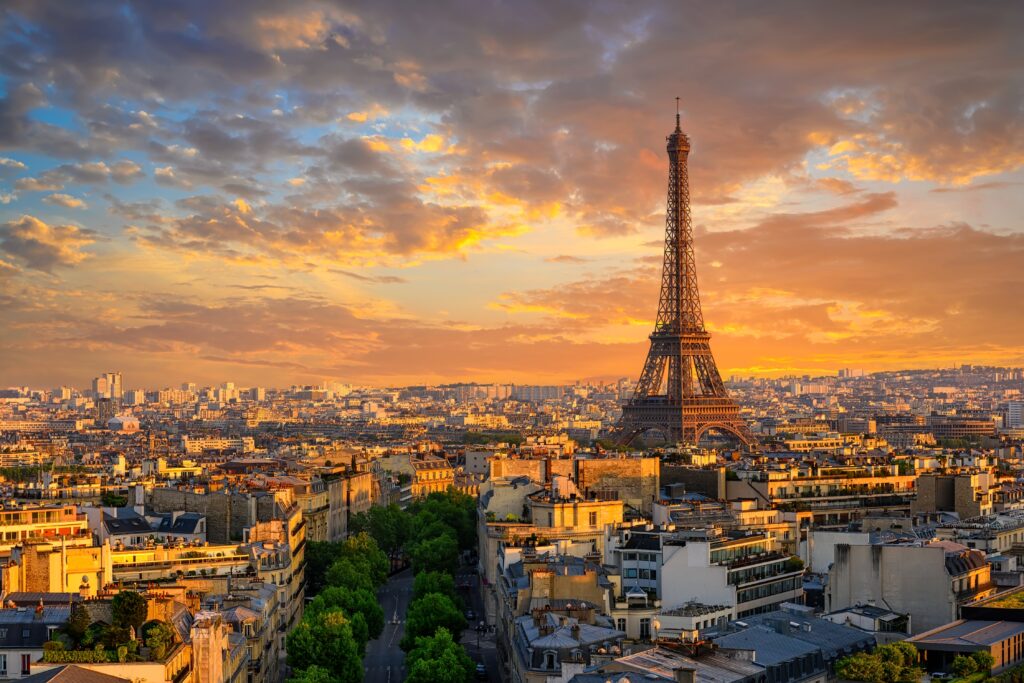 Paris, Eiffel Tower, golden sunset skyline, cityscape from above, editorial travel photo, no people.